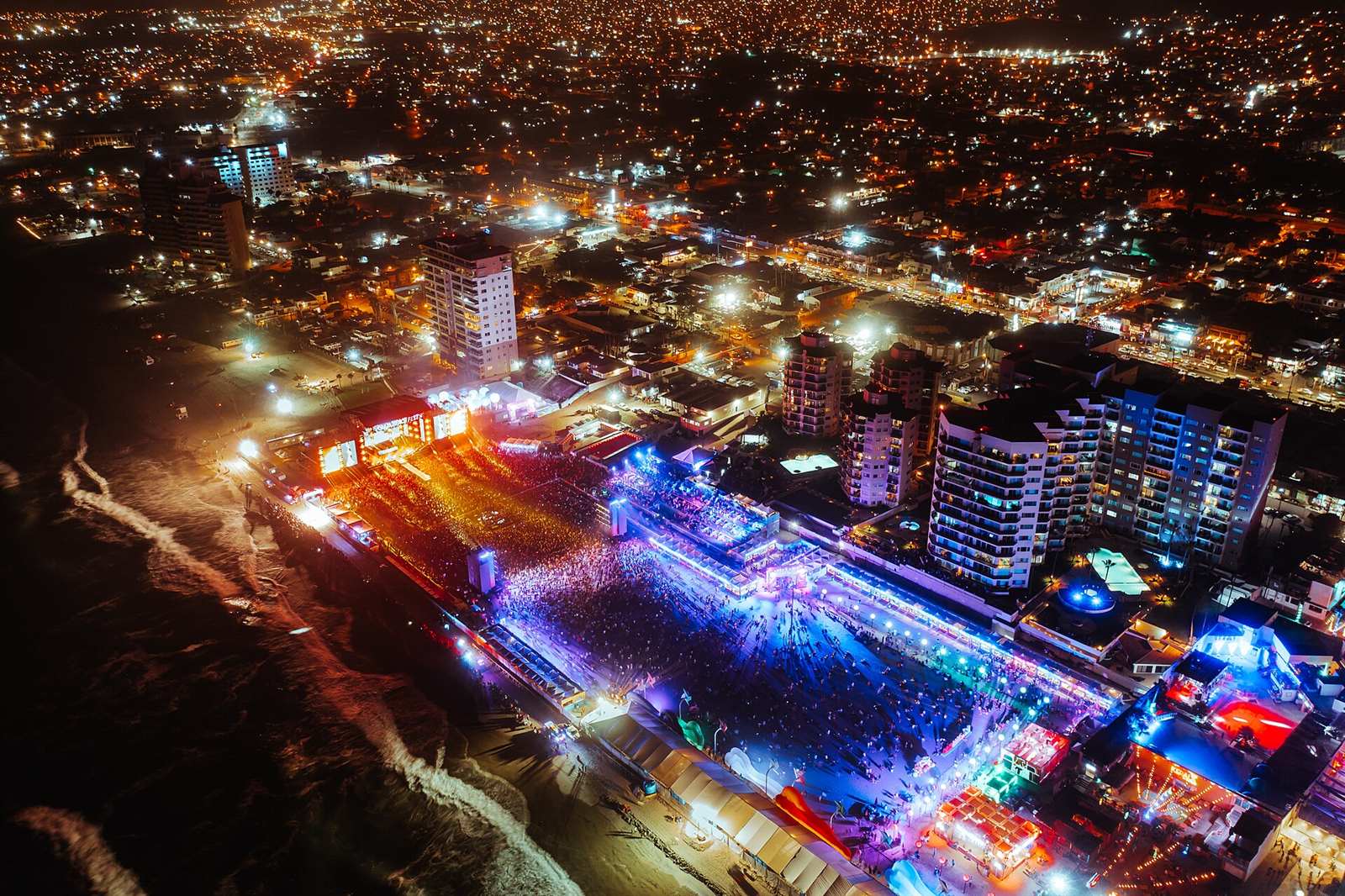 Rosarito shoreline and city lights from above at night